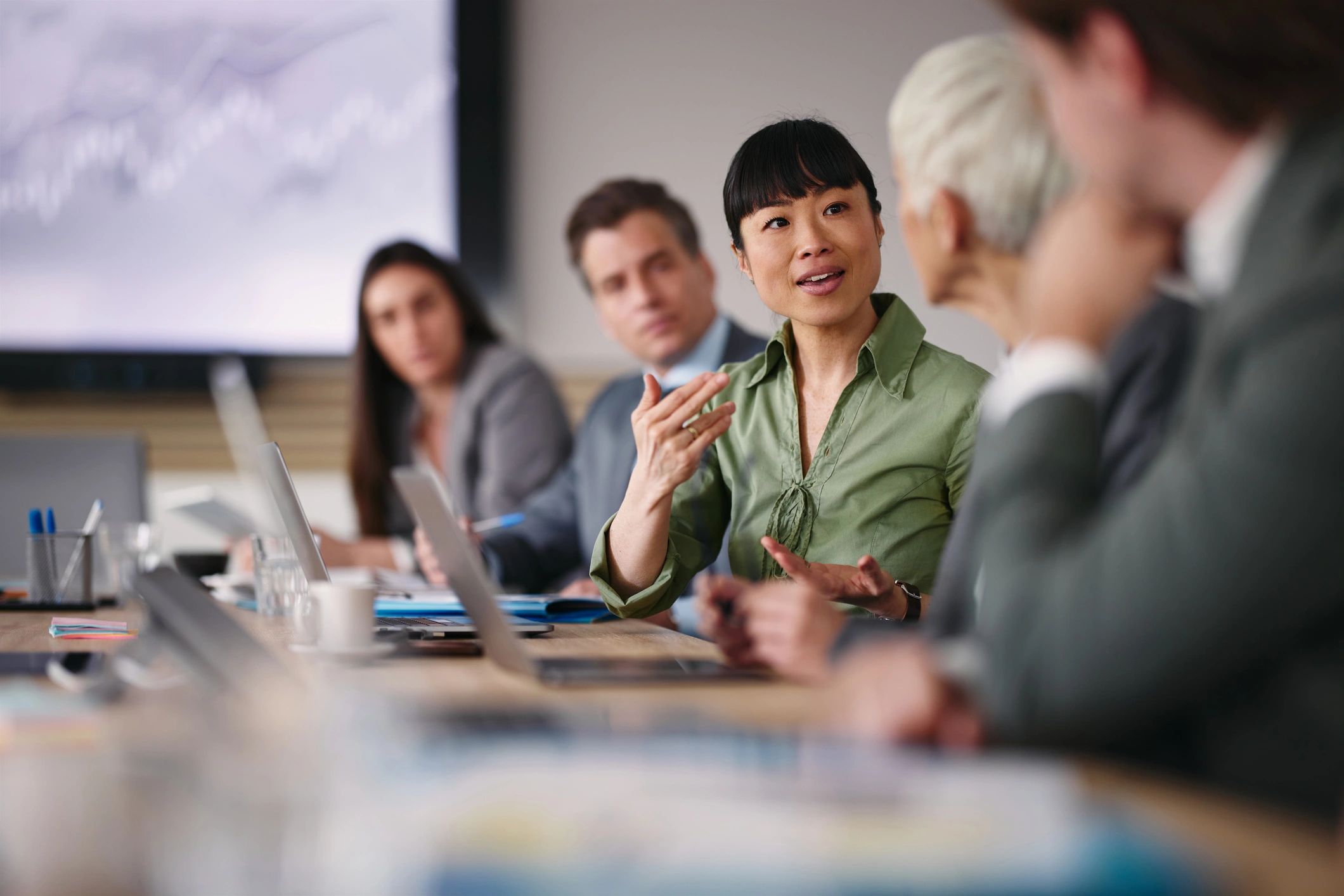 Engineering professionals collaborating in a modern office